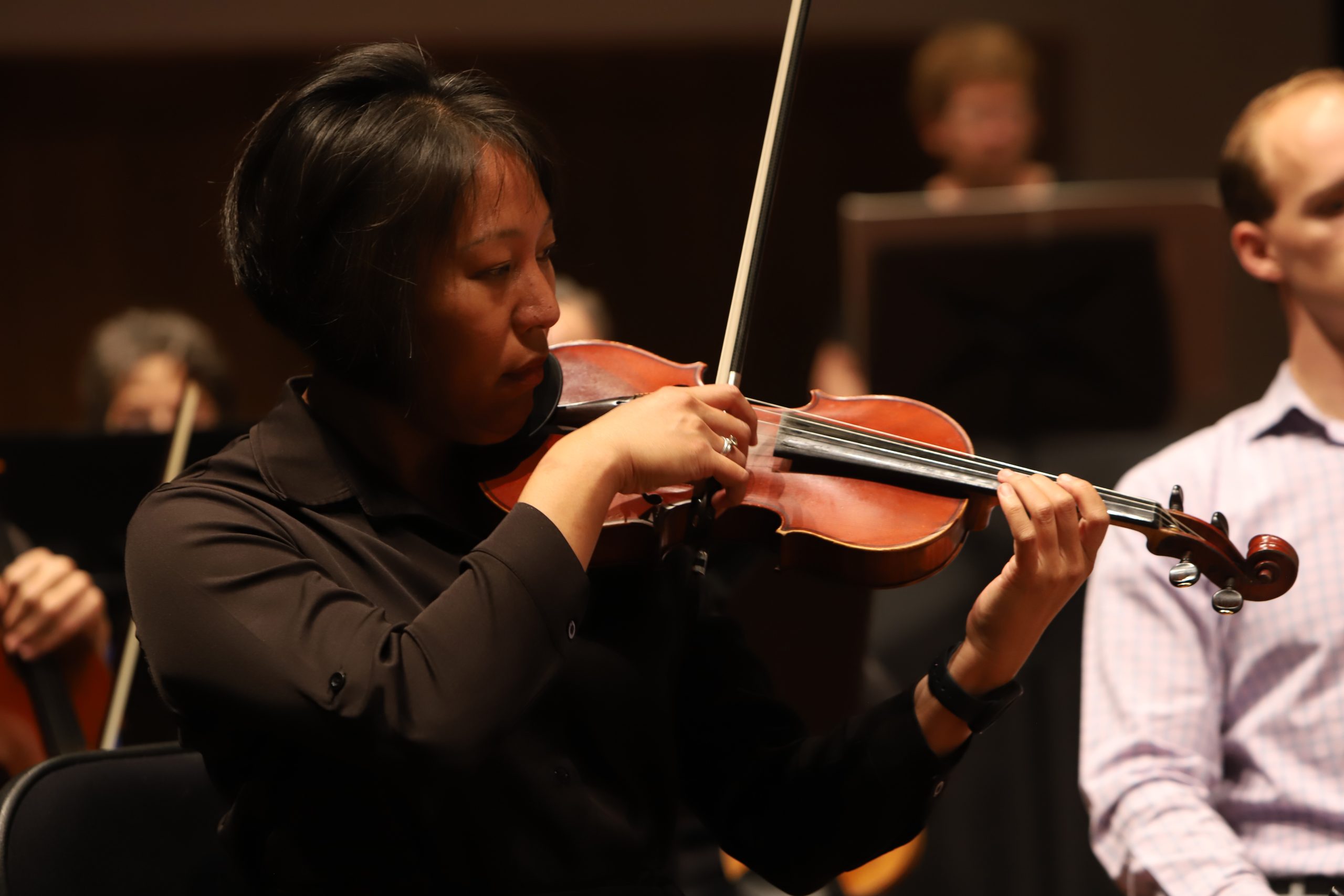 concertmaster Grace Seng playing the violin